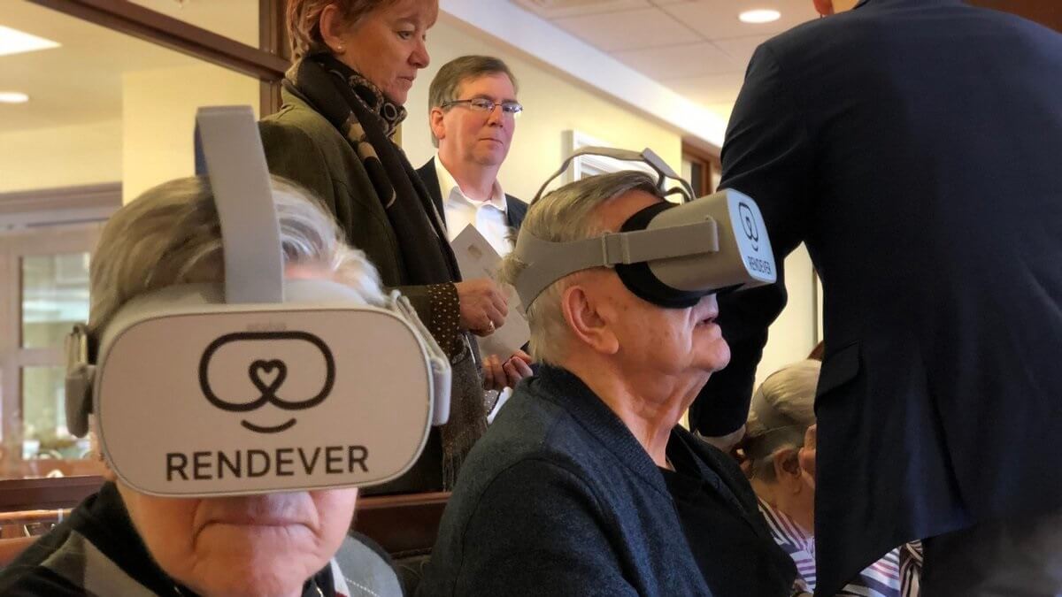 Seniors wearing VR goggles