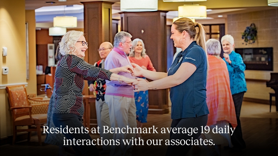 a senior and an associate dancing